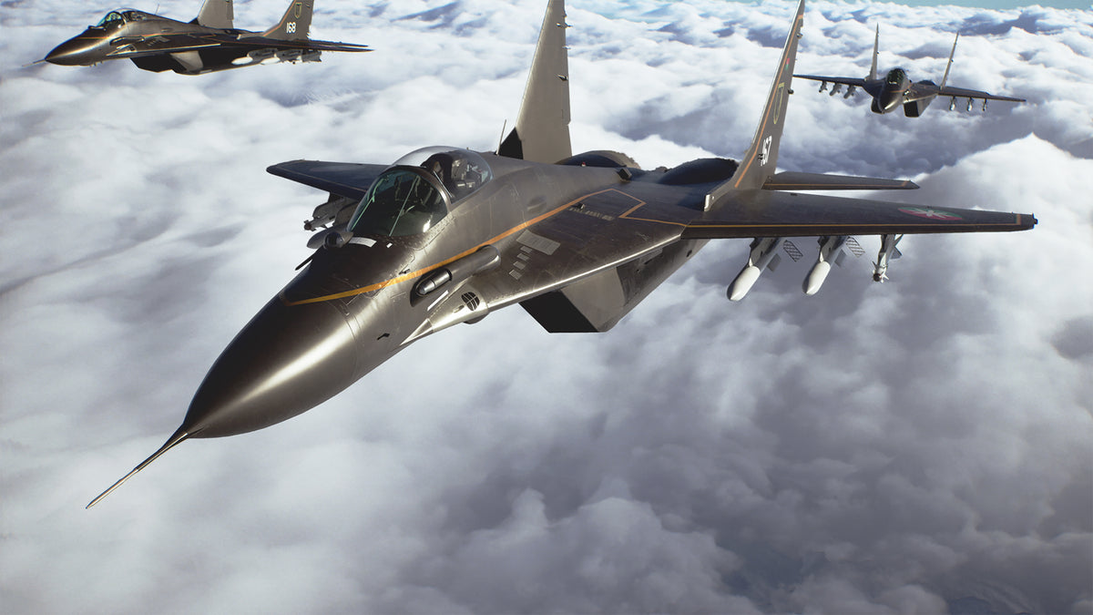 Ace Combat 8: Wings of Theve fighter jets flying above the clouds