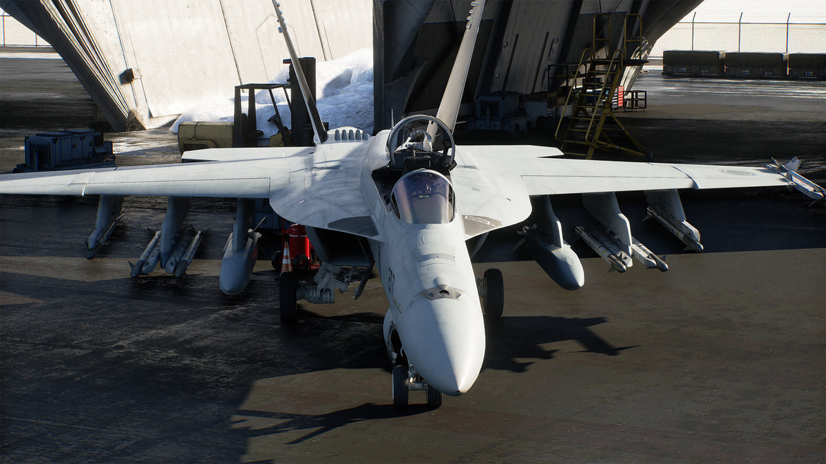 Ace Combat 8: Wings of Theve armed fighter jet preparing for take-off at an air base